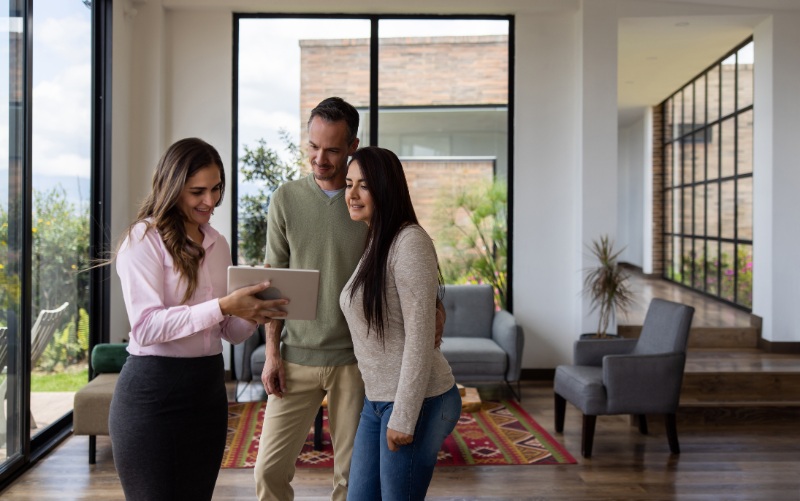 real estate agent showing a home